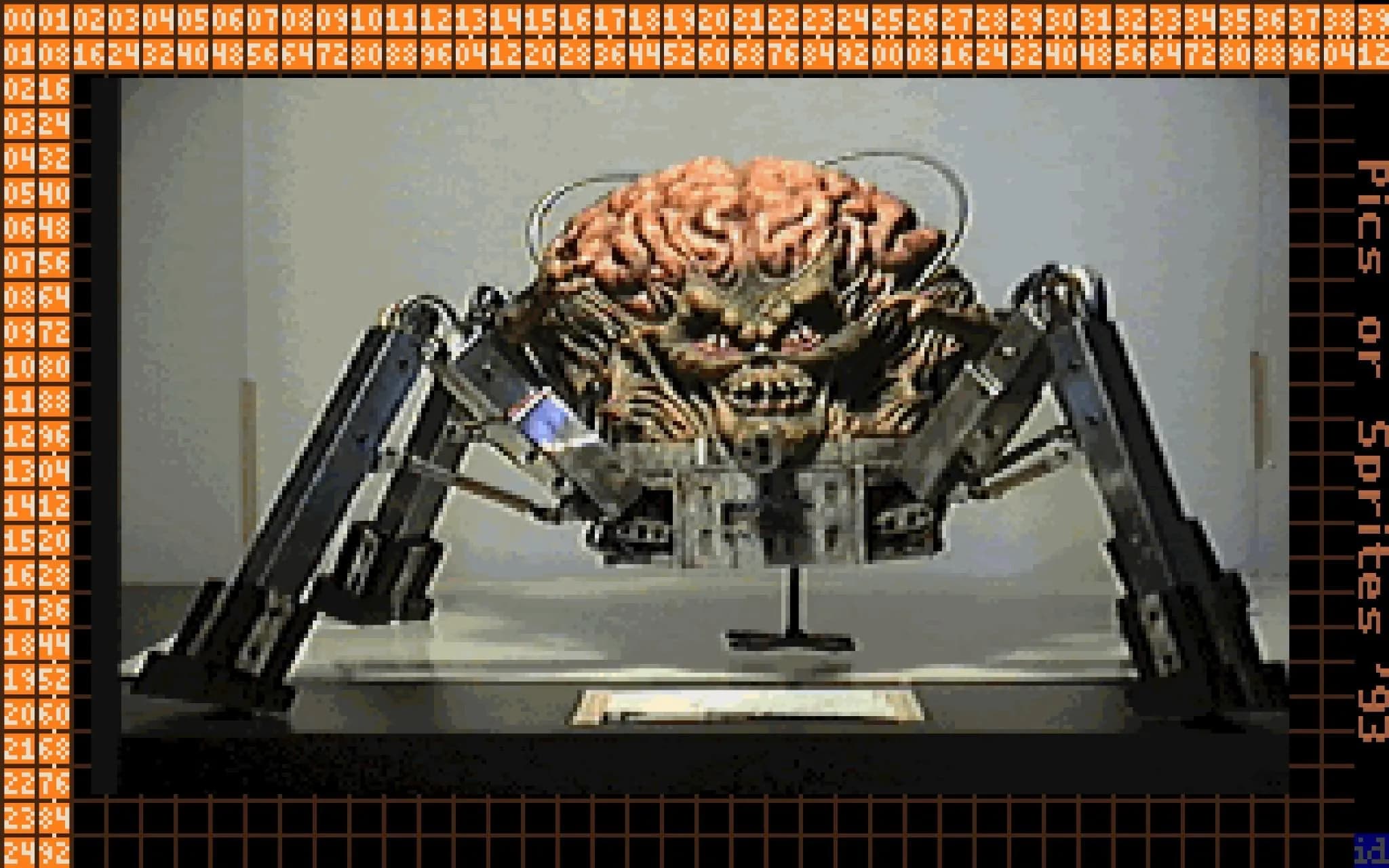 A not yet altered photograph of the original Spider Mastermind model from Doom. A text banner running down the right side of the image reads "Pics or sprites 93".