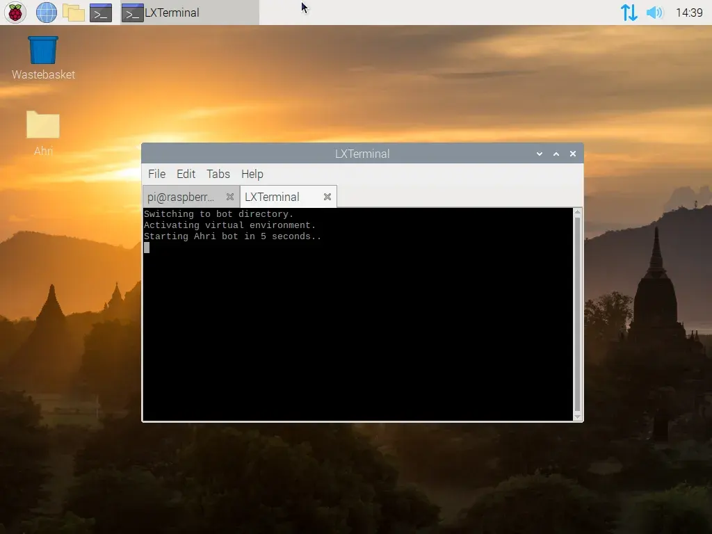 A screenshot of the Raspberry Pi OS desktop. A new tab has been created on the terminal window, which displays the following lines of text. Switching to bot directory. Activating virtual environment. Starting ahri bot in 5 seconds. This text indicates that the script is being run correctly when a new terminal session is created.